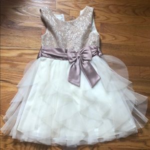 This is a cream and white colored dress